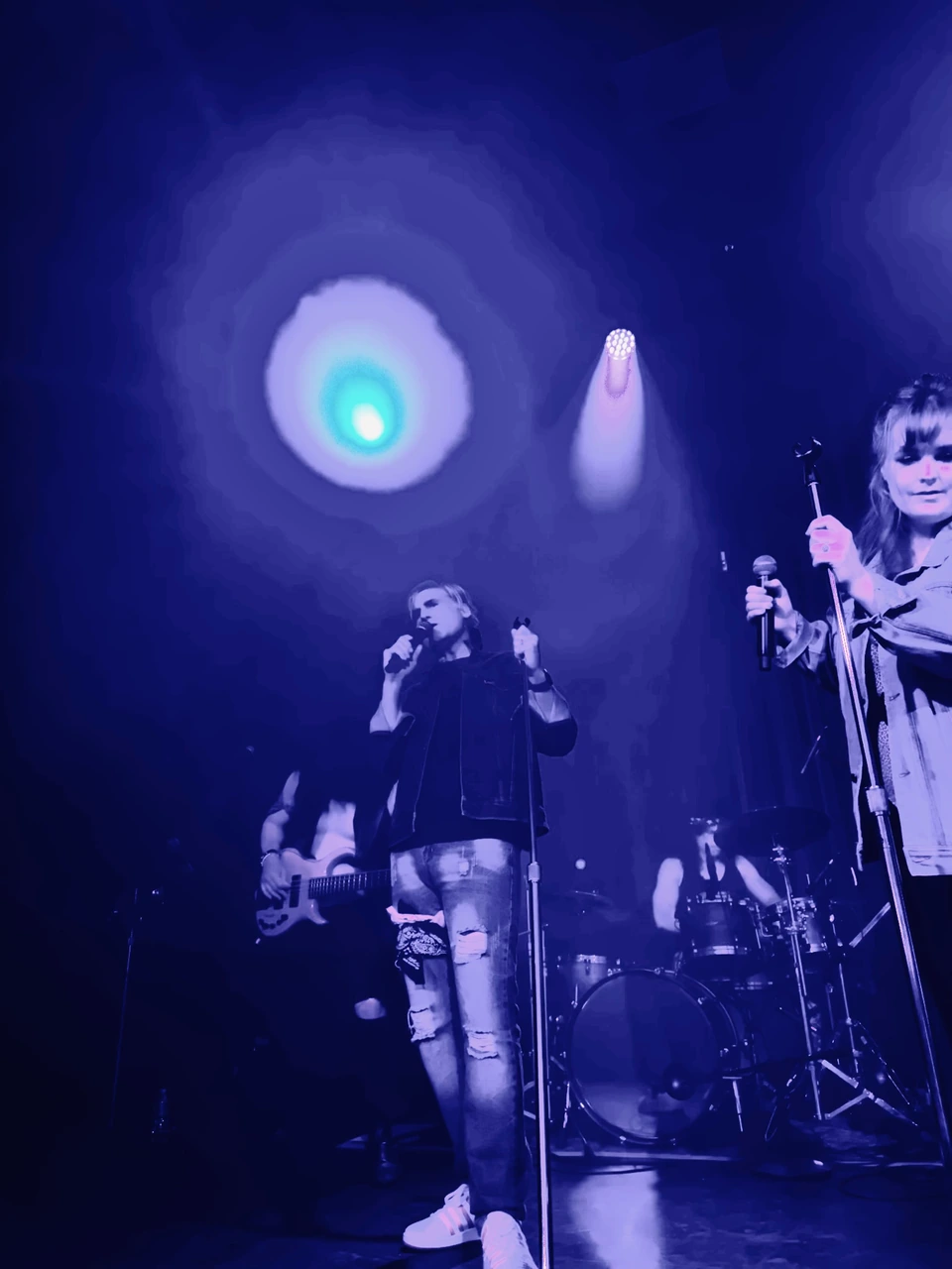Walkmans singers and rhythm section under the stage lights